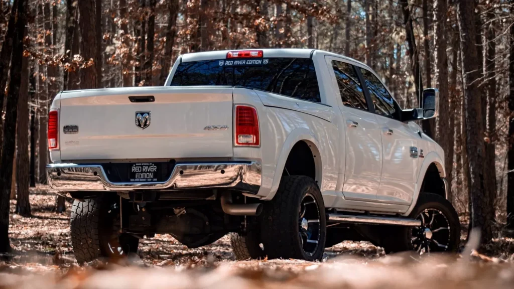 White Dodge crew cab pickup truck
