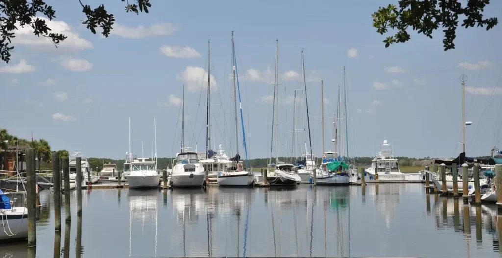 Scenic marina in Florida with sailboats and yachts docked on a peaceful day