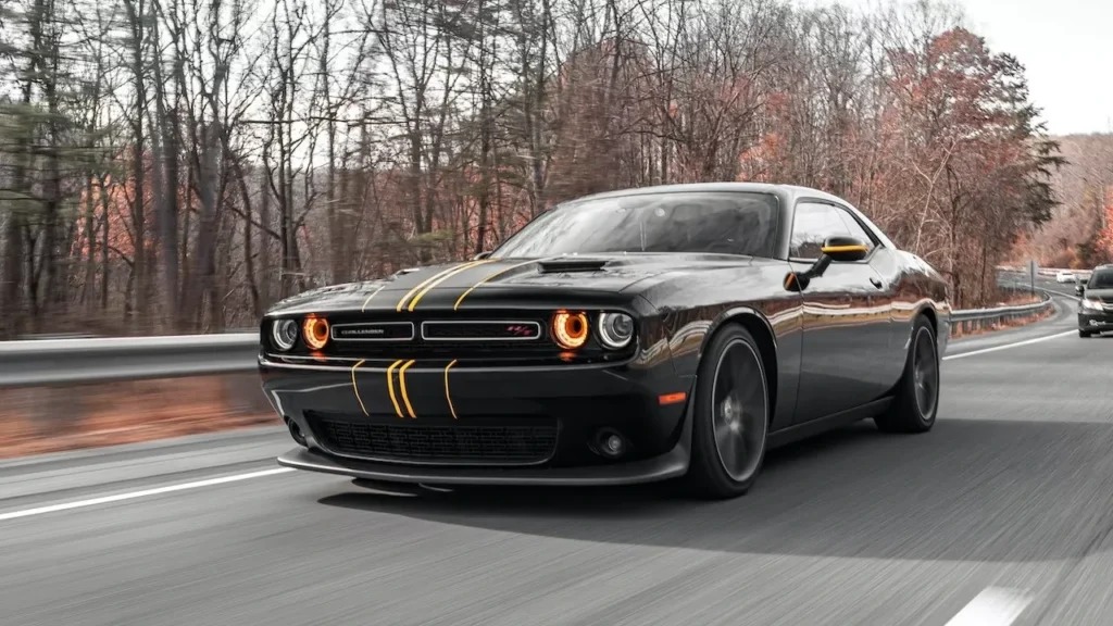 Black sports car on a motorway