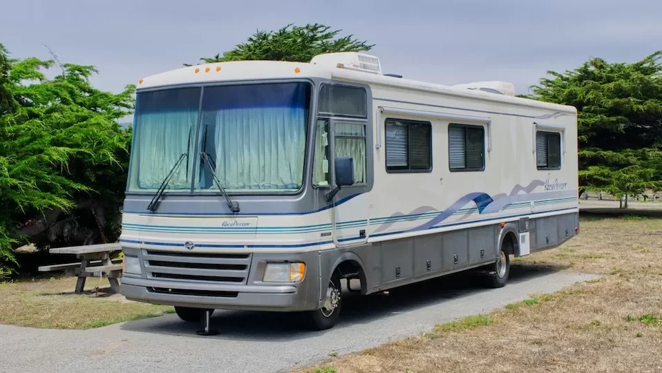 Explore the scenic campsite with a comfortable RV parked at Half Moon Bay