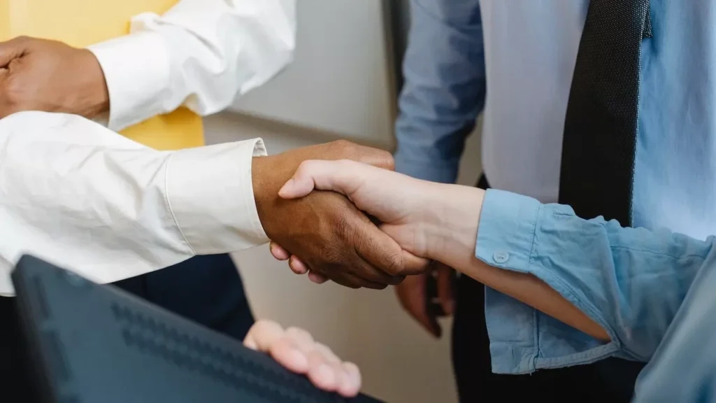 Close-up view of a diverse business handshake signaling cooperation and partnership