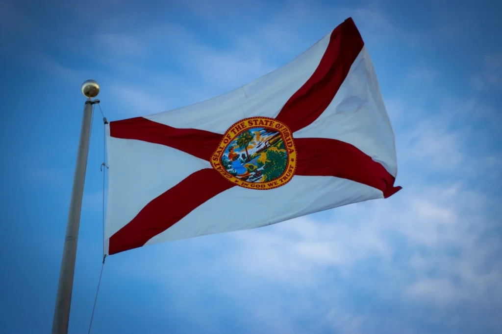 The State flag of Florida flies on Daytona Beach